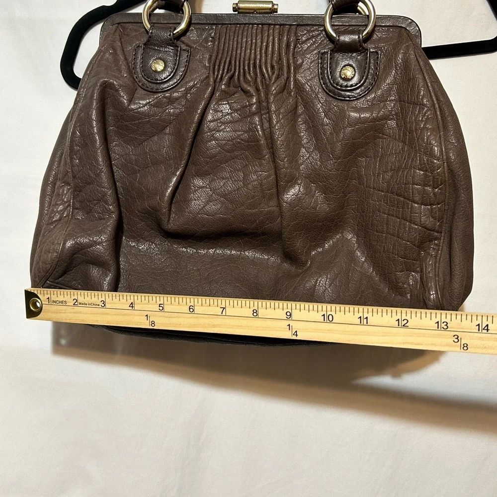 Elliott Lucca excellent used